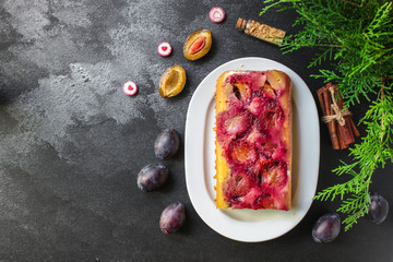 plum pie (delicious dessert, pastries with fruit) menu concept. food background. copy space. Top viev