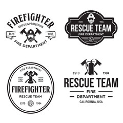 Fototapeta premium Set of firefighter volunteer, rescue team emblems, labels, badges and logos in monochrome style.