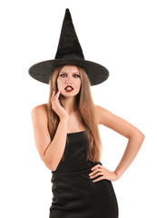 Beautiful woman dressed as witch for Halloween on white background