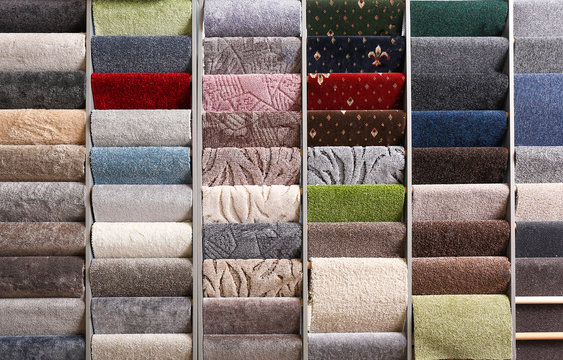 Different samples of carpets in shop