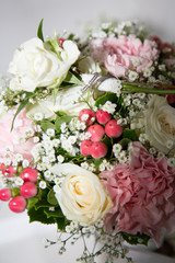wedding fresh bunch of pink peonies and roses with marriage rings+