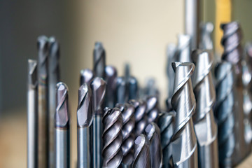 The various type  cutting tools of CNC machine on the stock shelf  in the store room. The set of...