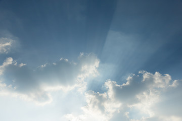 Clear blue sky with cloud and ray of sunlight. Use for nature wallpaper or background.