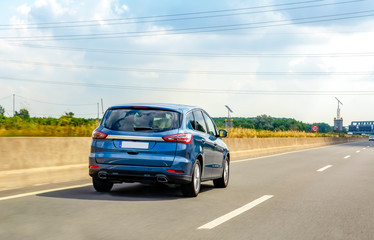 Car on highway in summer