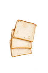 Slices of wheat bread for toast on white isolated background