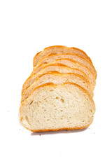 Slices of wheat bread for toast on white isolated background