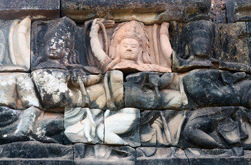 Ancient bas-relief with Apsaras at Terrace of the Elephants in Angkor Thom near Siem Reap, Cambodia
