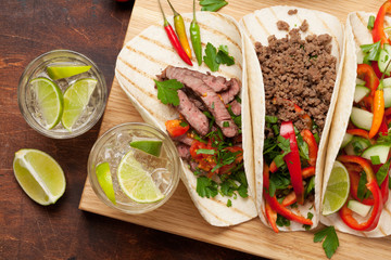 Mexican tacos and caipirinha cocktail