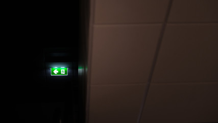 Emergency exit sign Shining light in the dark