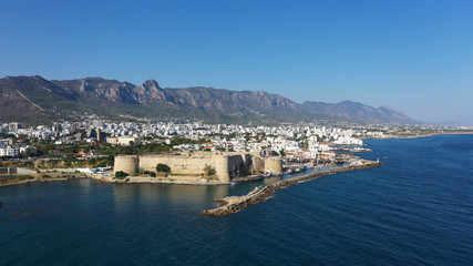 Kyrenia (Girne) is a city on the north coast of Cyprus, known for its cobblestoned old town and horseshoe-shaped harbor.