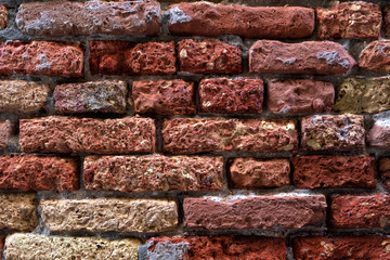Old masonry of red and yellow bricks
