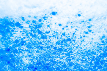 Obraz premium Beautiful abstract texture color white and blue bubbles background in water on blue background pattern clear soapy shiny
