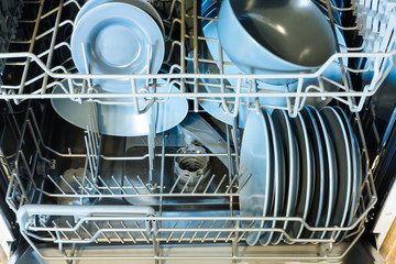 Open dishwasher with clean dishes. Clean glasses after washing in the dishwasher. - 292732170