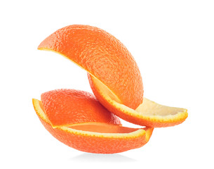 Pieces of orange peel isolated on a white background