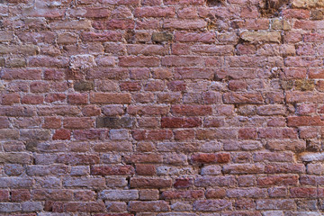Old red brown brick wall, old texture of red stone blocks