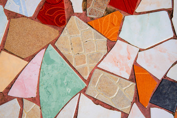 Multicolor ceramic mosaic floor. Creative recycled mosaic top view photo. Bathroom or kitchen floor design idea.