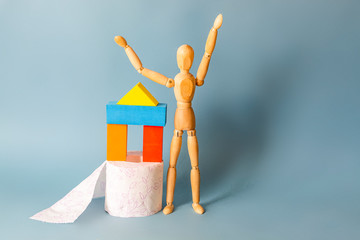 potty training concept. Roll of toilet paper and toys on blue background