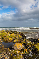 Fototapeta na wymiar The rocky coastline on the island of North Uist in the Western Isles