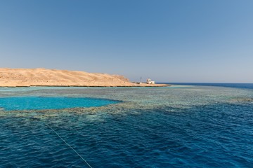Small island with coral reef