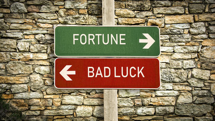 Fototapeta premium Street Sign Fortune versus Bad Luck