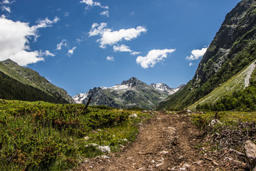 Alpine meadows and rocks in the Caucasus mountains in Russia