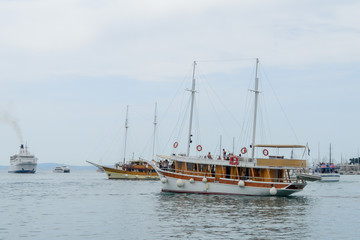 Fototapeta na wymiar Traditional wooden sailboat in port of Split, Croatia on June 15, 2019.