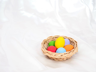 fresh eggs on wooden box with colorful painted on outer surface