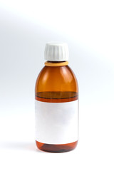 brown vessel with medicine and white label on white background