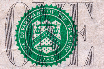 Fragment of a banknote one american dollar. Photographed close-up.
