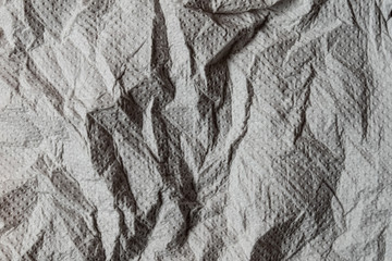 wrinkled paper napkin hard texture close up as a background