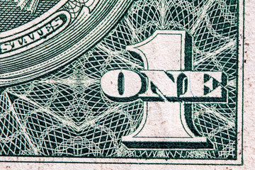 Fragment of a banknote one american dollar. Photographed close-up.