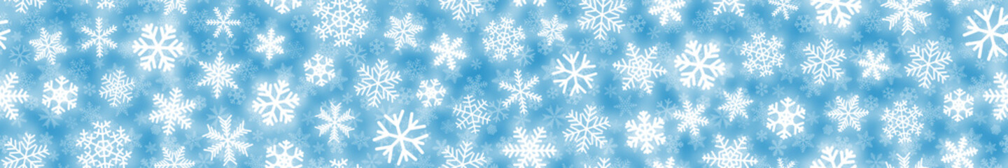 Fototapeta na wymiar Christmas horizontal seamless banner of white snowflakes on light blue background