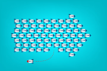 Think differently concept. Be different. Red rocket changing direction. New idea, change, trend, courage, creative solution, innovation and unique way concept.