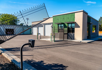 Gate opening at the entrance of a storage unit facility