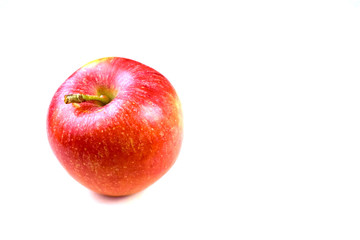 Fototapeta na wymiar Una manzana roja sobre fondo blanco