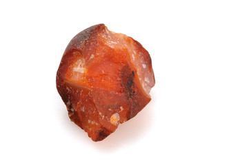 Mineral carnelian on a white background.