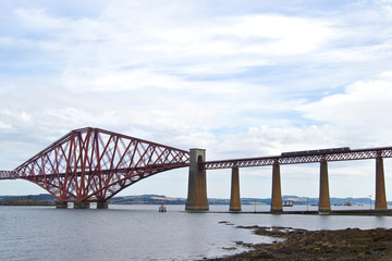 A train going over the Forth bridge in South Queensferry