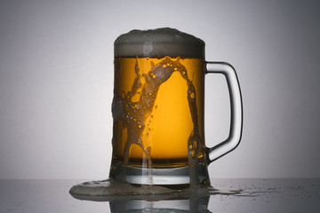 Glass of beer with foam