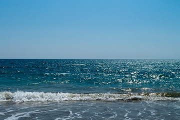 Blue sky and sea in sunlight