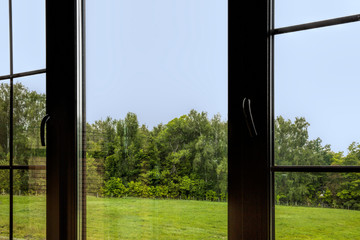 Open window with a view of the forest