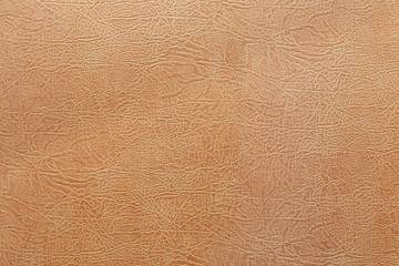 orange leatherette texture background close up