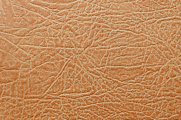 orange leatherette texture background close up