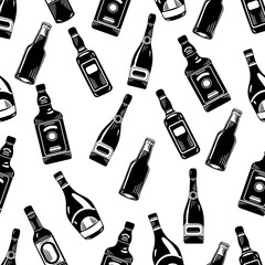 Vector hand drawn black and white seamless pattern of bottles. Whiskey, rum, wine, champagne, beer, tequila and chocolate liquor bottles.In the graphic style on white background.