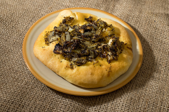 Homemade cebularz, Traditional Polish pancake with onion and common poppy seeds, from Jewish tradition, baked in Lublin, Poland.
