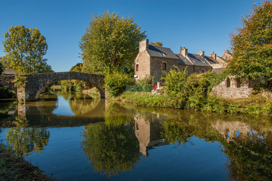 A stone bridge cross over La Rance River, L&eacute;hon, France.