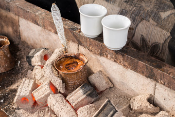 Turkish coffee cooked in copper coffee pot