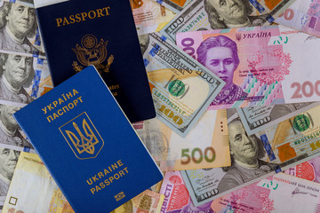 US Passport and ukrainian biometric passpor of US dollar money and ukrainian money hryvnia of dual citizens
