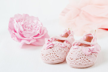 Pink shoes, elegant clothes for a little girl.