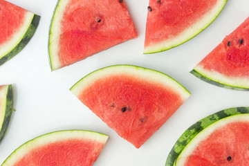 Close-up of fresh slices of red watermelon, top view, summer or food concept, flat lay