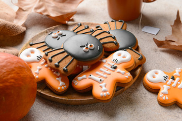 Creative cookies for Halloween celebration on plate